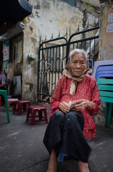 Old Woman Smoking a Cigarette