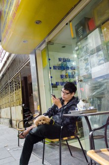 Tea and Poodle in Front of Shop