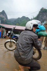 Hmong Man packs his Honda